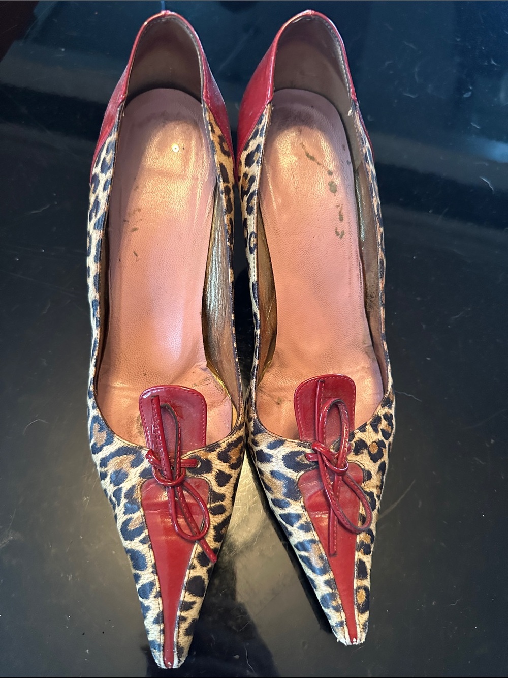 Dolce & Gabbana Leopard Print Pointed Pumps with Red Trim and Bow Accent